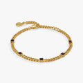 February birthstone bracelet in gold tone with a purple amethyst center stone