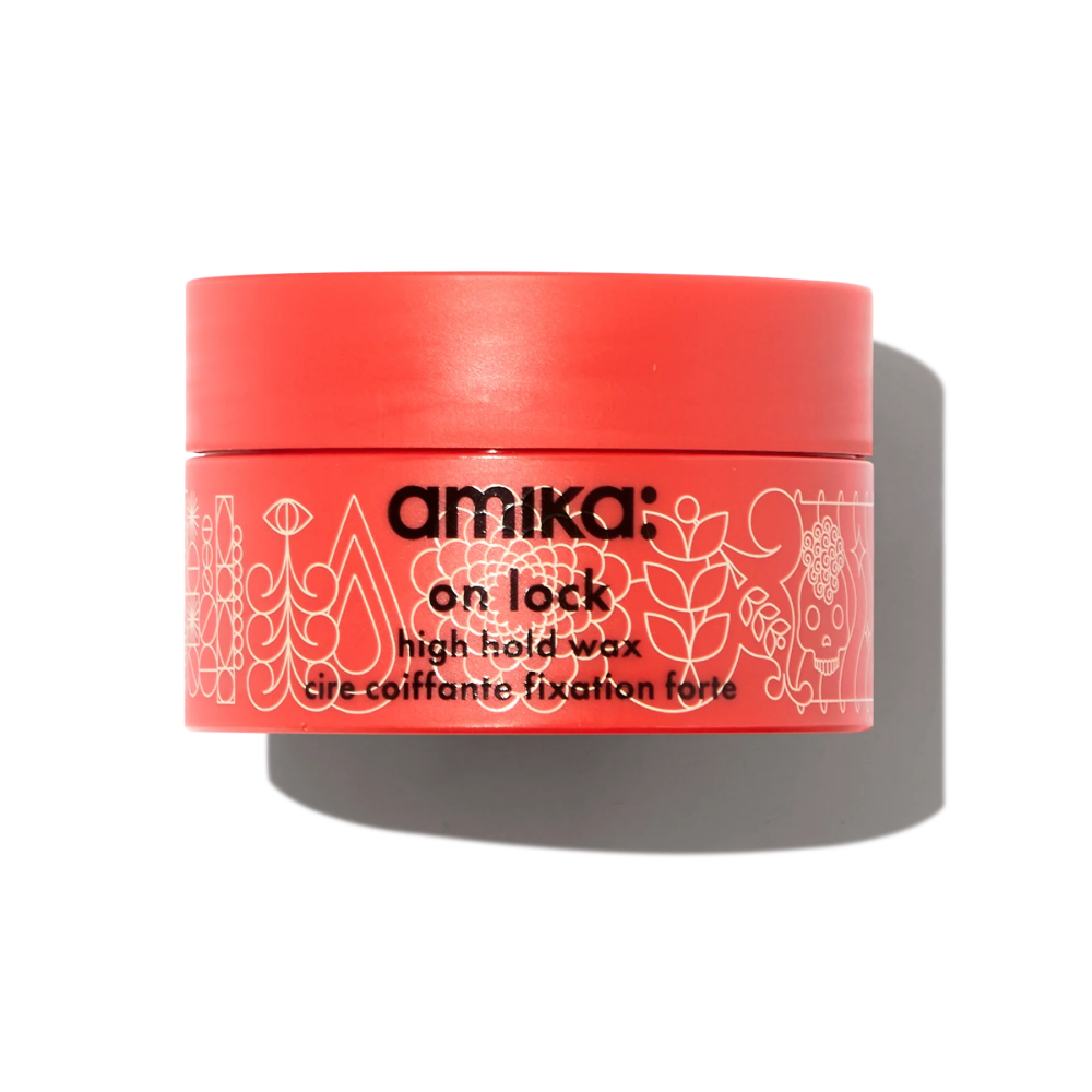 Amika On Lock High Hold Hair Wax orange and black packaging 1.7 oz container