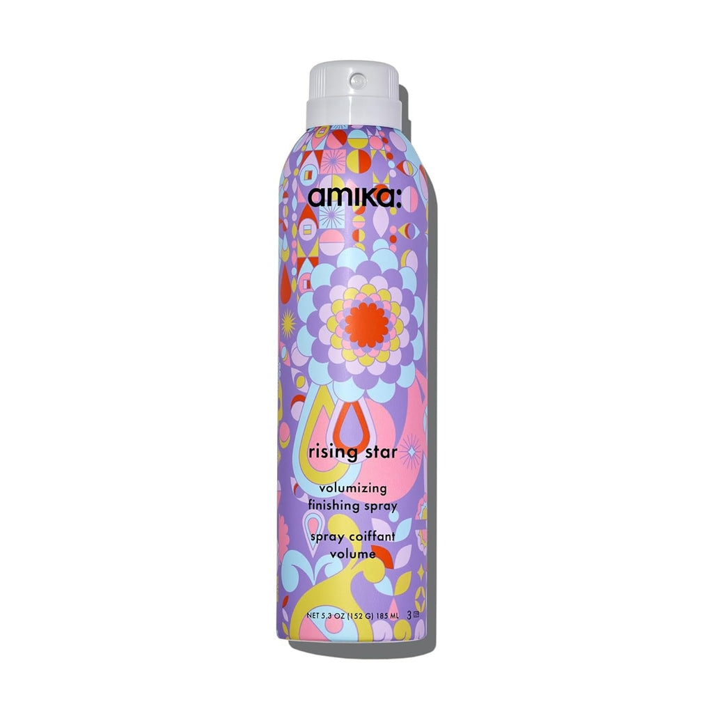 Amika Rising Star Volumizing Finishing Spray bottle in purple packaging with vibrant, abstract retro accents.