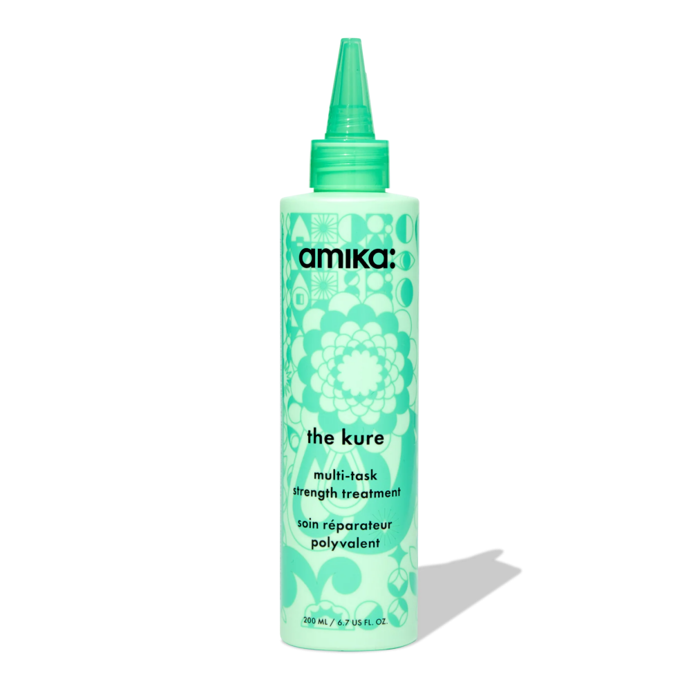 Bottle of Amika The Kure Multi-Task Strength Repair Treatment 6.7 oz
