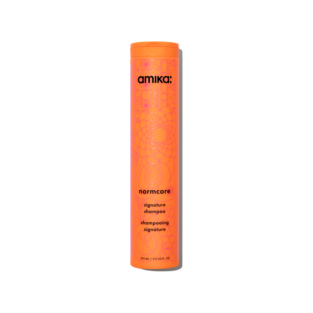 Amika Normcore Signature Shampoo orange bottle 9.2oz
