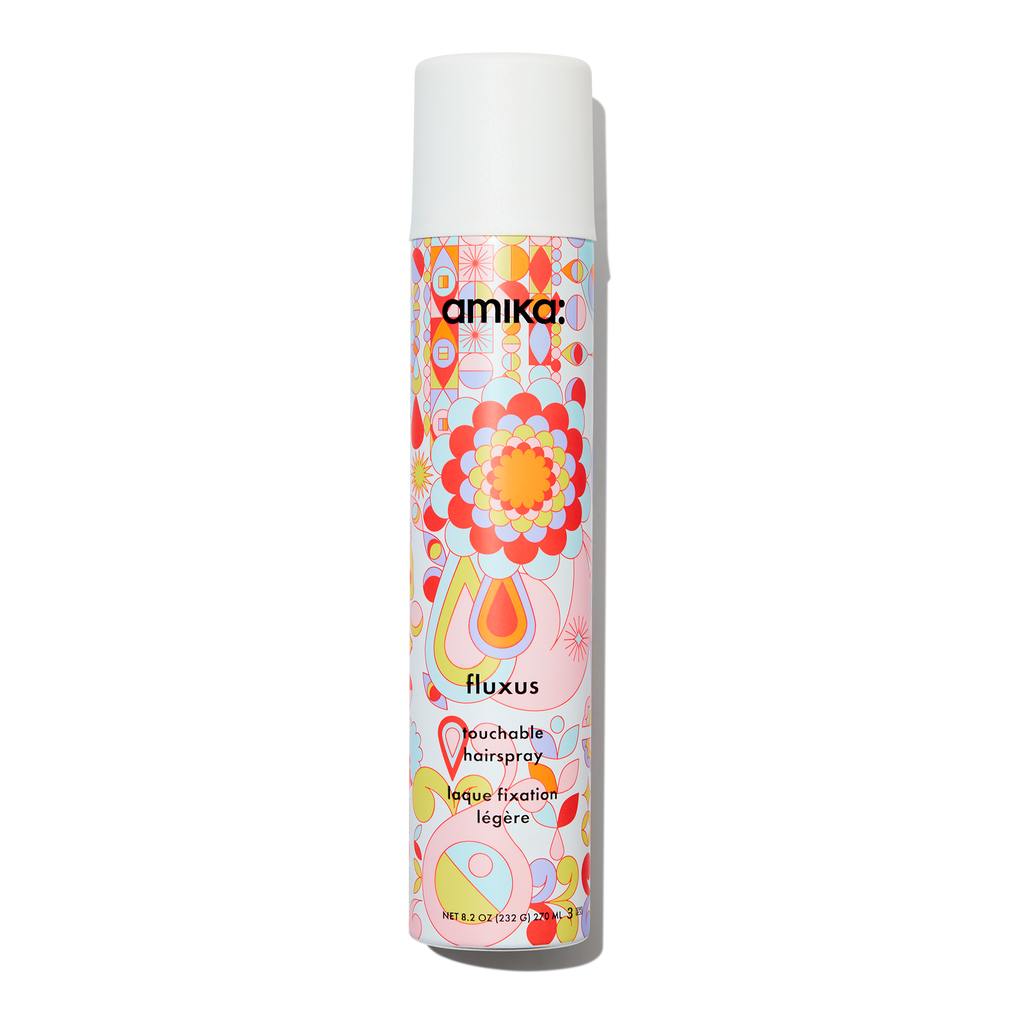 Amika Fluxus Touchable Hairspray 8.2oz with vibrant abstract pattern