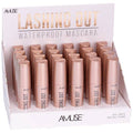 Close-up of Lashing Out Waterproof Mascara wand and long black lashes