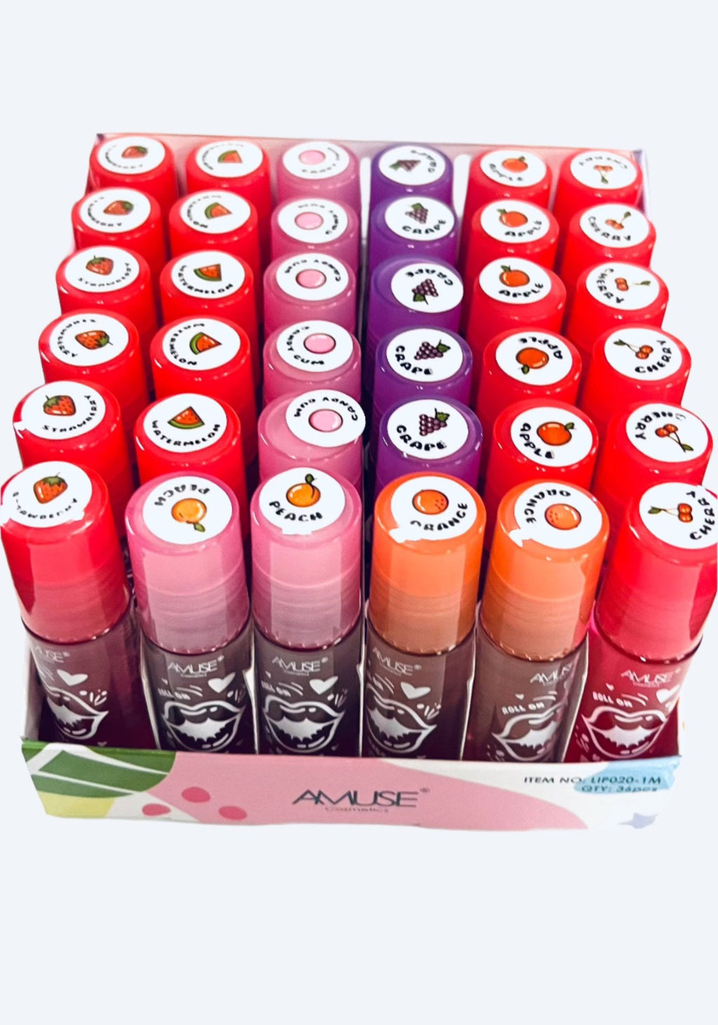 Amuse roll-on fruit lip gloss in orange and peach scents with Y2K aesthetic packaging