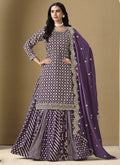 Purple art silk lehenga style suit with heavy embroidery and gota patti