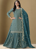 Turquoise art silk lehenga style suit with intricate gota patti embroidery for weddings