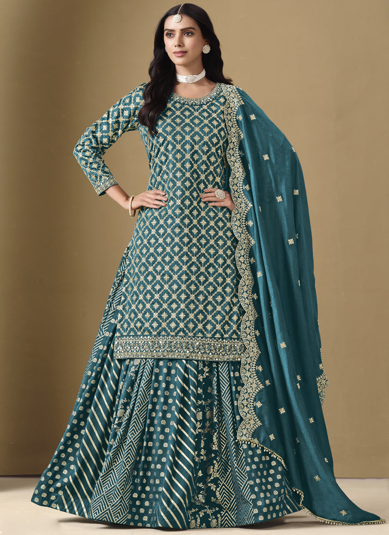 Turquoise art silk lehenga style suit with intricate gota patti embroidery for weddings