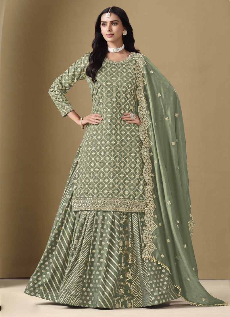 Light green art silk lehenga style suit with shimmering embroidery details
