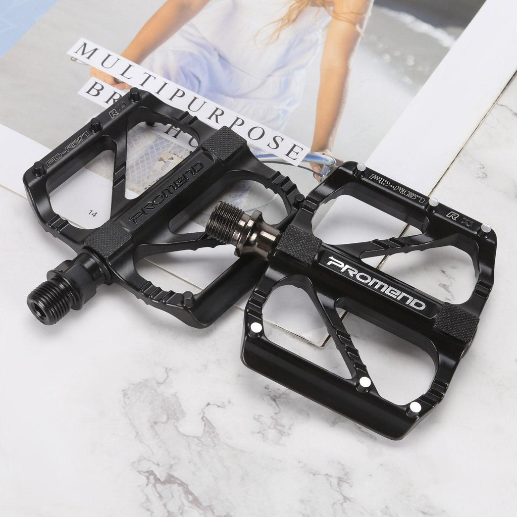 Black ultralight quick-release flat pedals for road and mountain bikes
