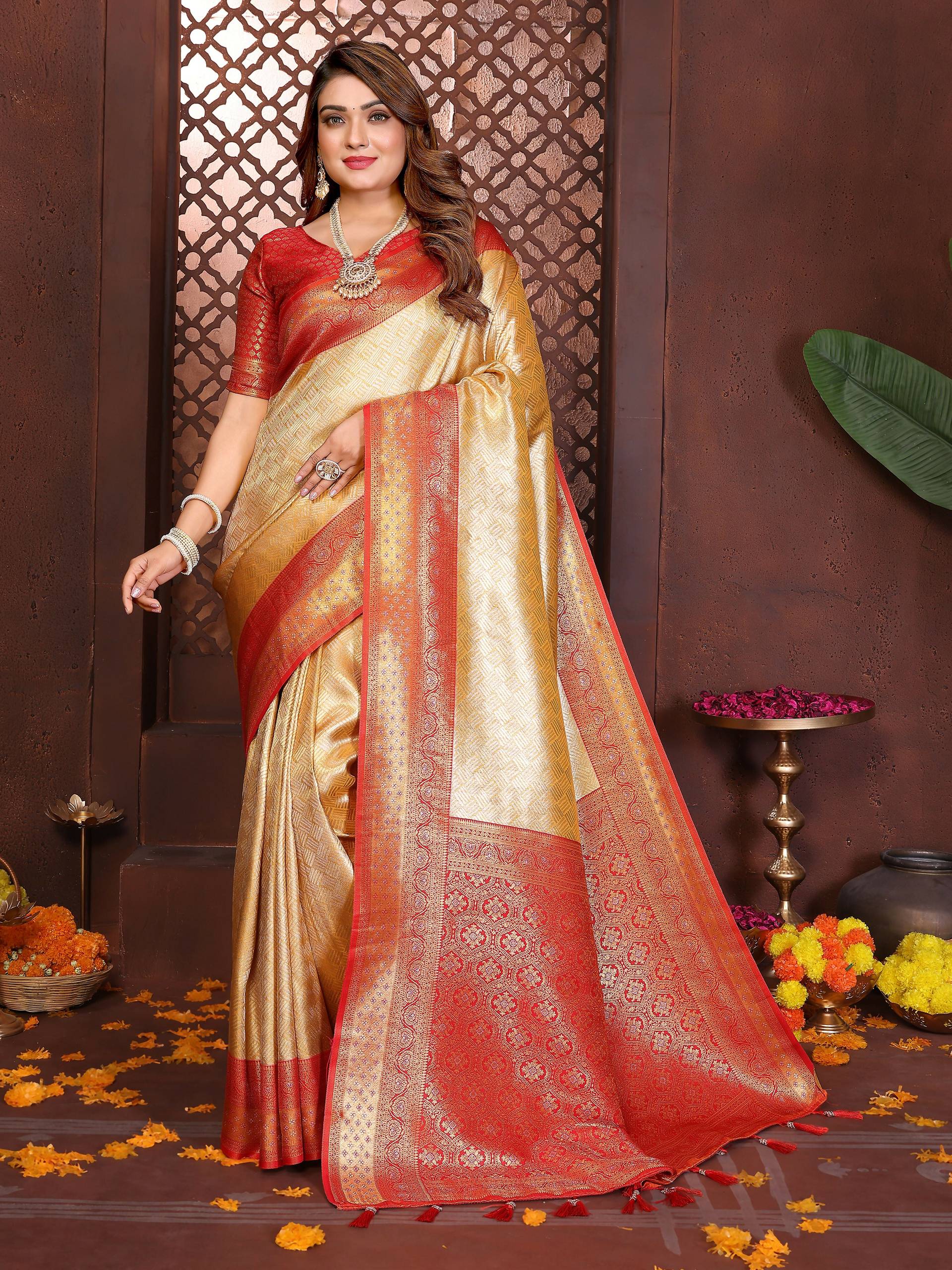 Aastha Fashion cream color tissue silk saree with intricate woven details