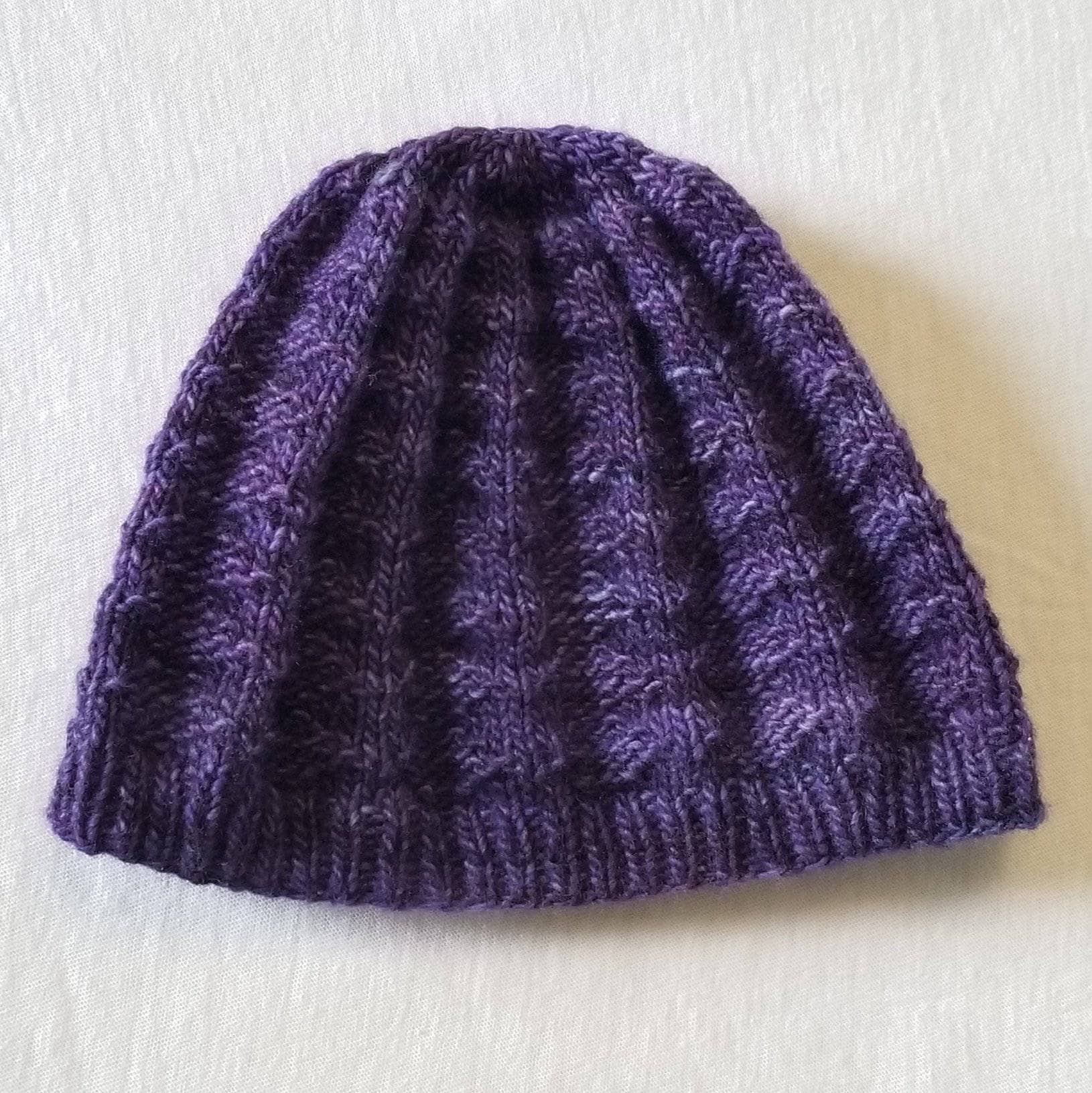 Close-up of a hand-knitted beanie made using the Arctic Beanie Easy Knitting Pattern.