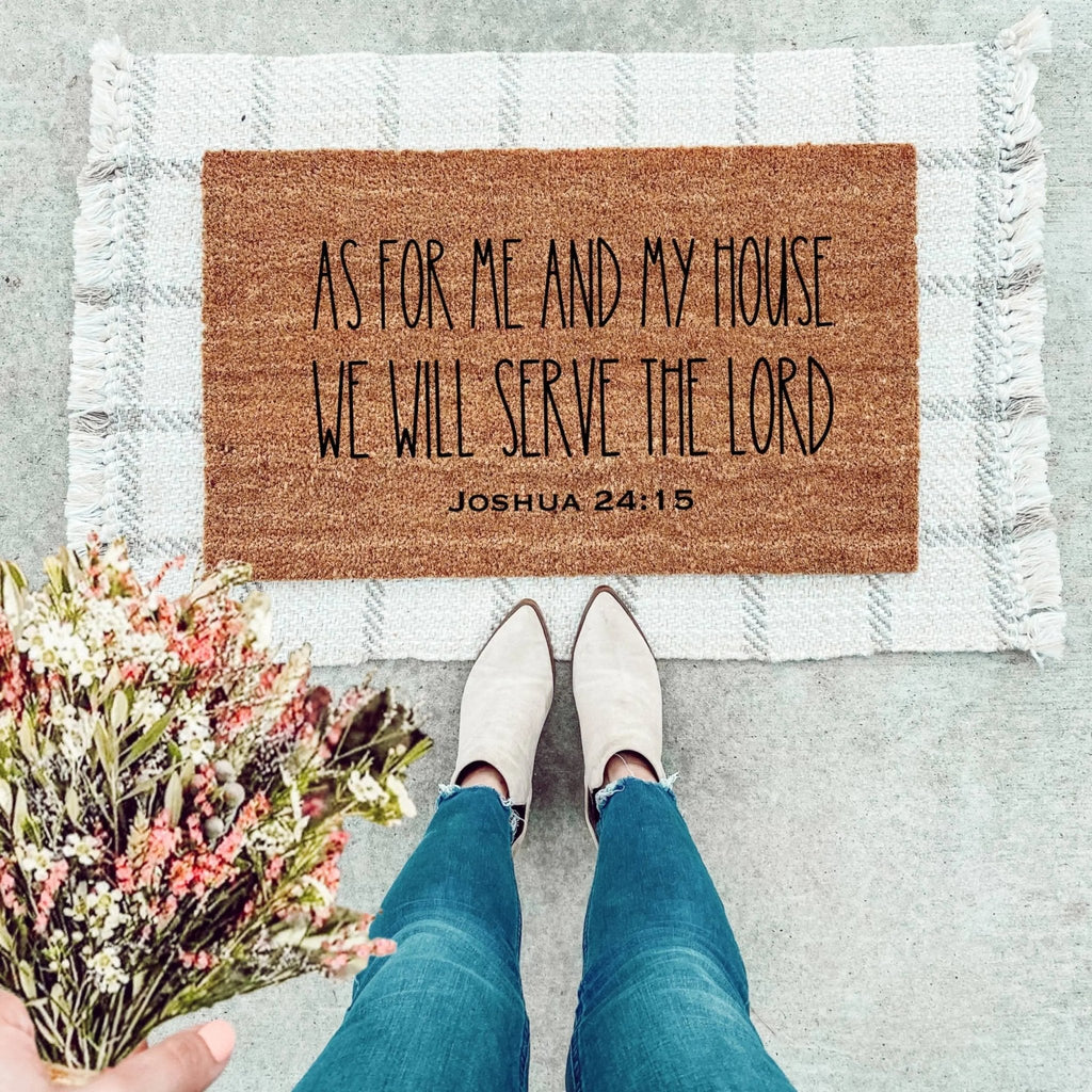 Traditional farmhouse doormat with 'As For Me And My House' and 'Joshua 24:15' printed in black on brown coir.