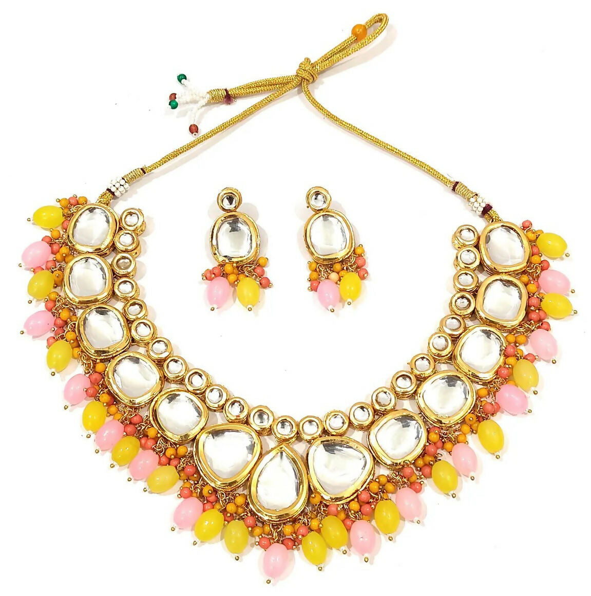 Close up of gold plated Kundan stone necklace set with high-quality detailing