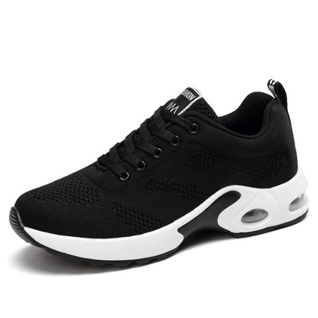 Women’s blue and purple athletic sneakers with breathable knit mesh and platform sole