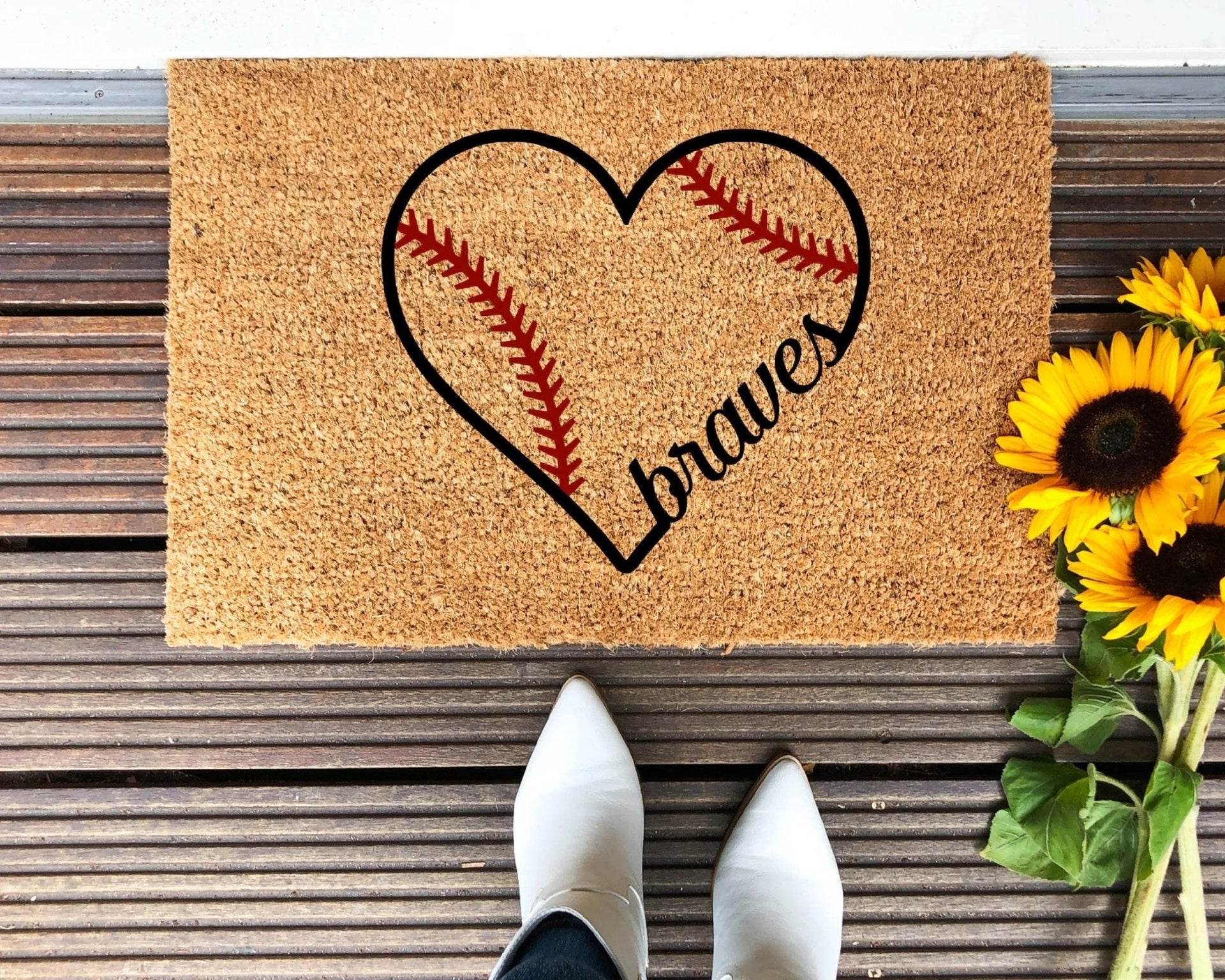 Atlanta Braves sports team doormat with natural coir finish and rubber backing.