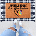 Autism Awareness house doormat with a welcoming message on a neutral background