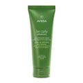 Aveda Be Curly Advanced Curl Enhancer Cream bottle for frizz control and hydration