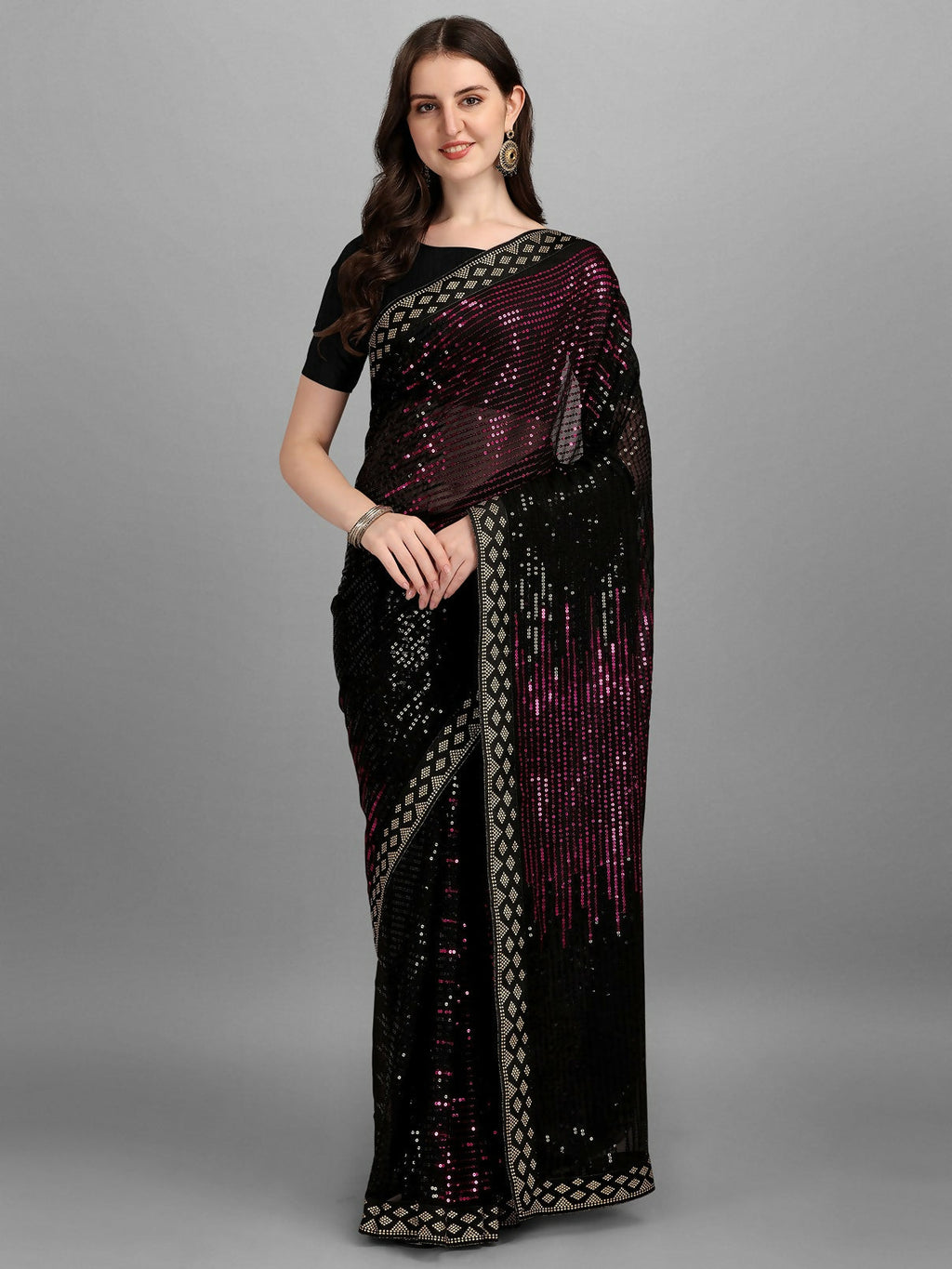 Elegant black georgette saree with embroidery for evening wear