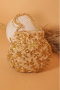 Golden velvet potli bag with intricate pearl handwork for formal ethnic wear