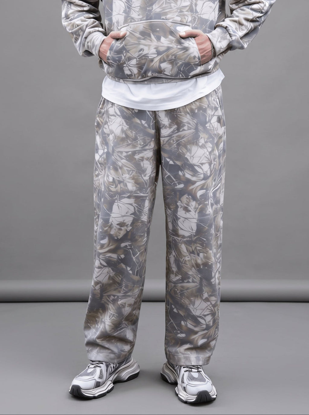 Unisex oversized heavyweight French Terry sweatpants in botanical grey camo with an open-hem straight leg fit