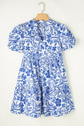 Royal blue dress with a feminine print and trendy puff sleeves.