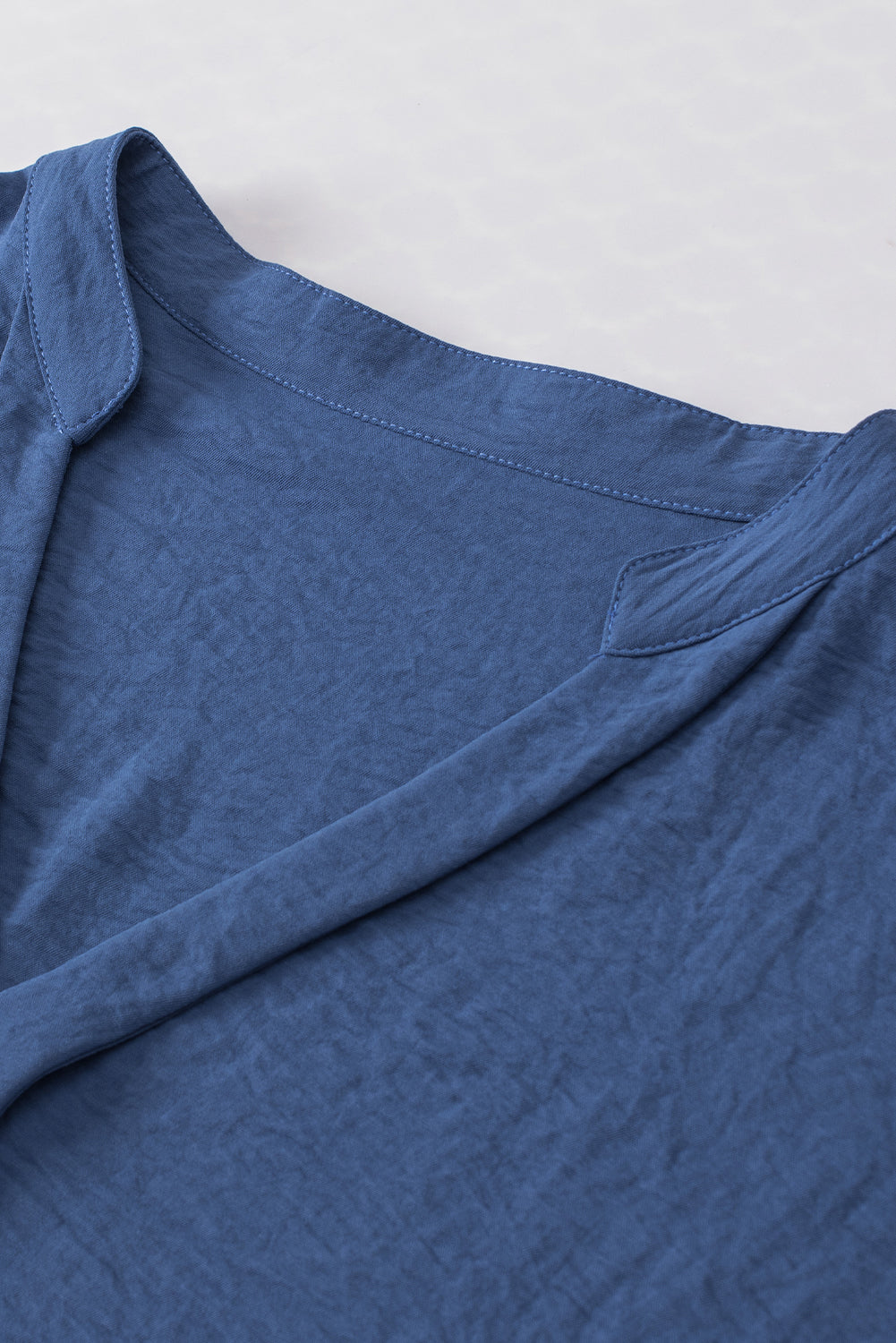 Solid Crinkle Textured Batwing Sleeve V-Neck Blouse in Blue