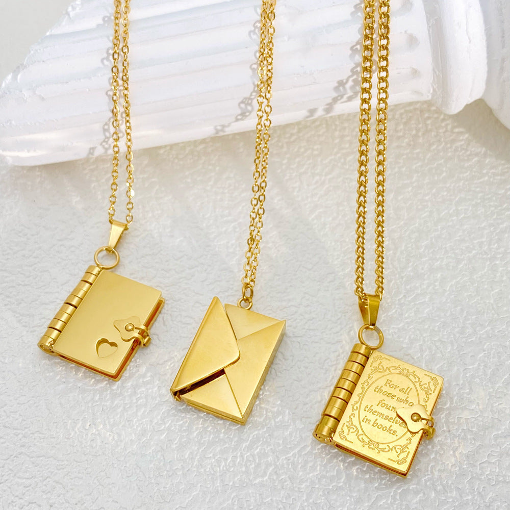 18k gold plated openable book pendant necklace featuring a polished titanium steel finish.