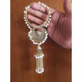Gold-tone bangle with white pearls and elegant latkan charms for parties