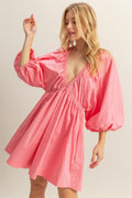 Pink cotton poplin mini dress with balloon sleeves and side pockets