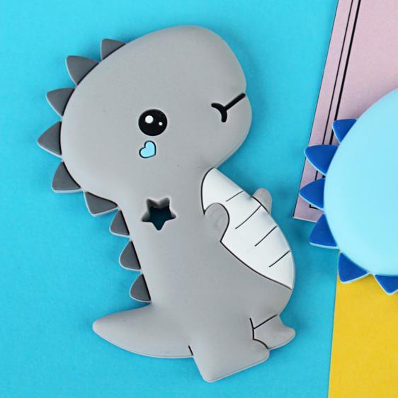 Dinosaur-shaped silicone teether beads in various colors for sensory play