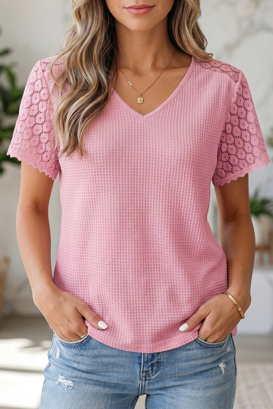 Nyomi women’s pink waffle knit blouse with V-neckline and lace details