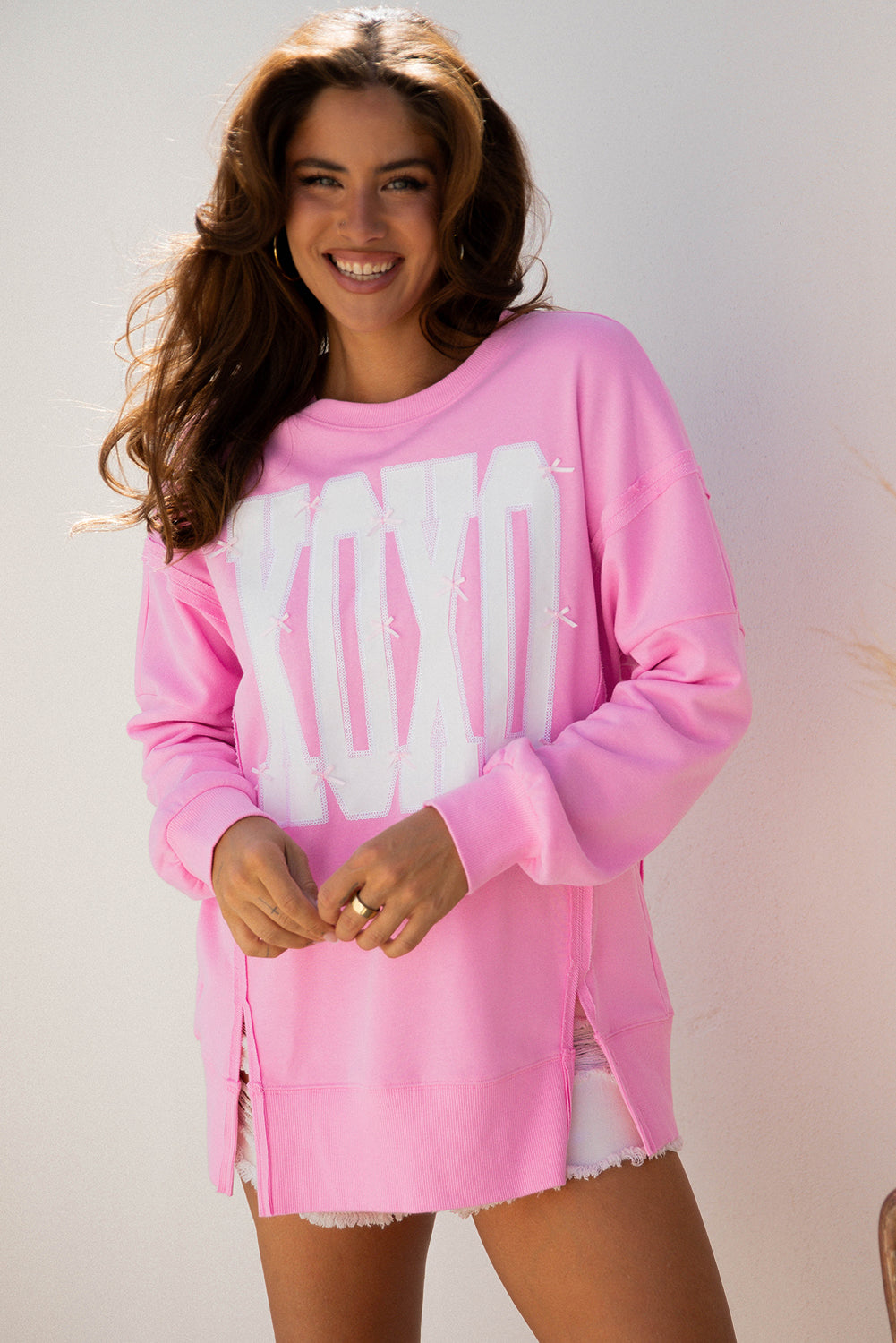 Pink Bow Sequin XOXO Baggy Sweatshirt | Exposed Seam Detail