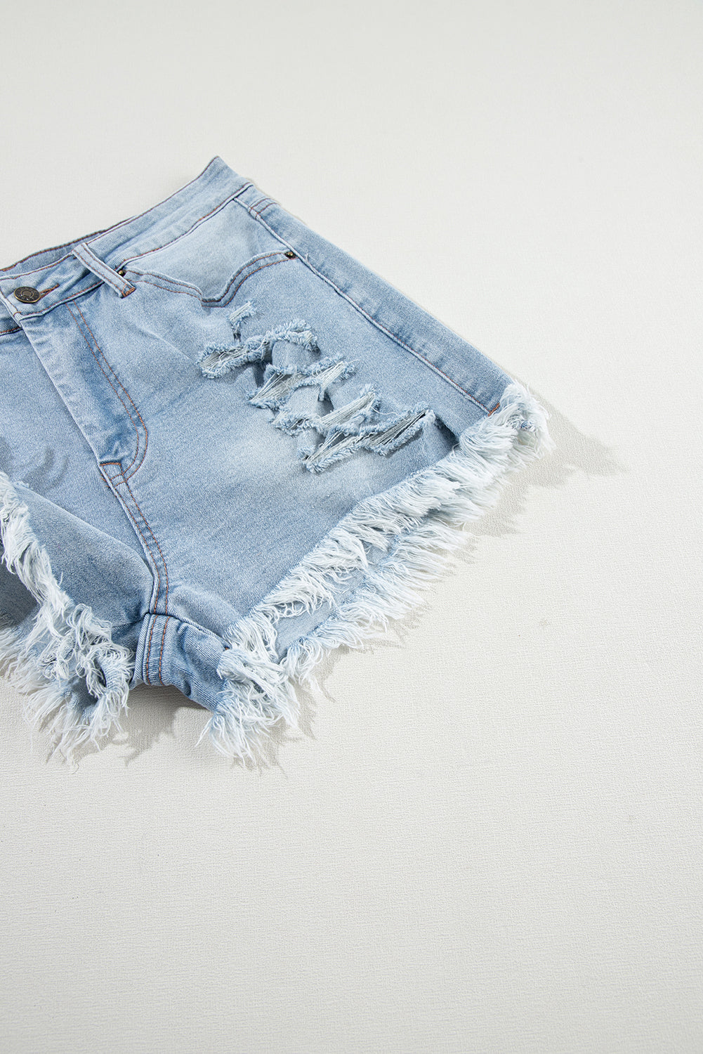 Distressed Denim Raw Hem High Waist Shorts in Light Blue