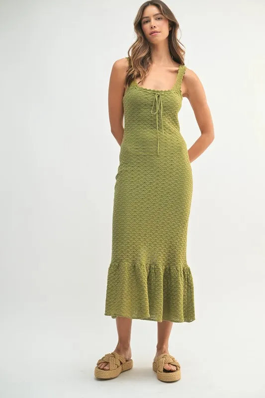 Olive green sleeveless crochet knit midi dress with a feminine ruffled hem