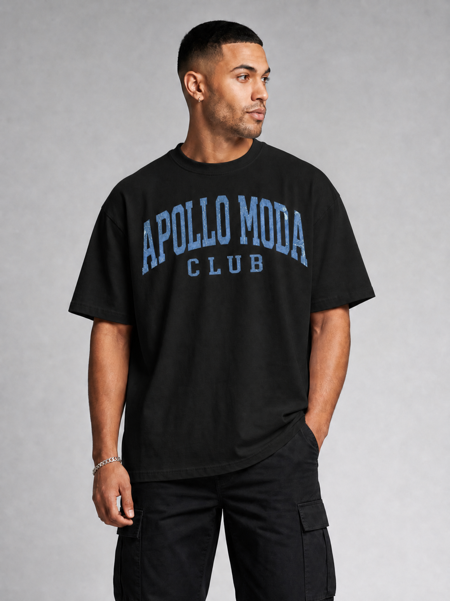 Black oversized collegiate t-shirt with blue distressed graphic