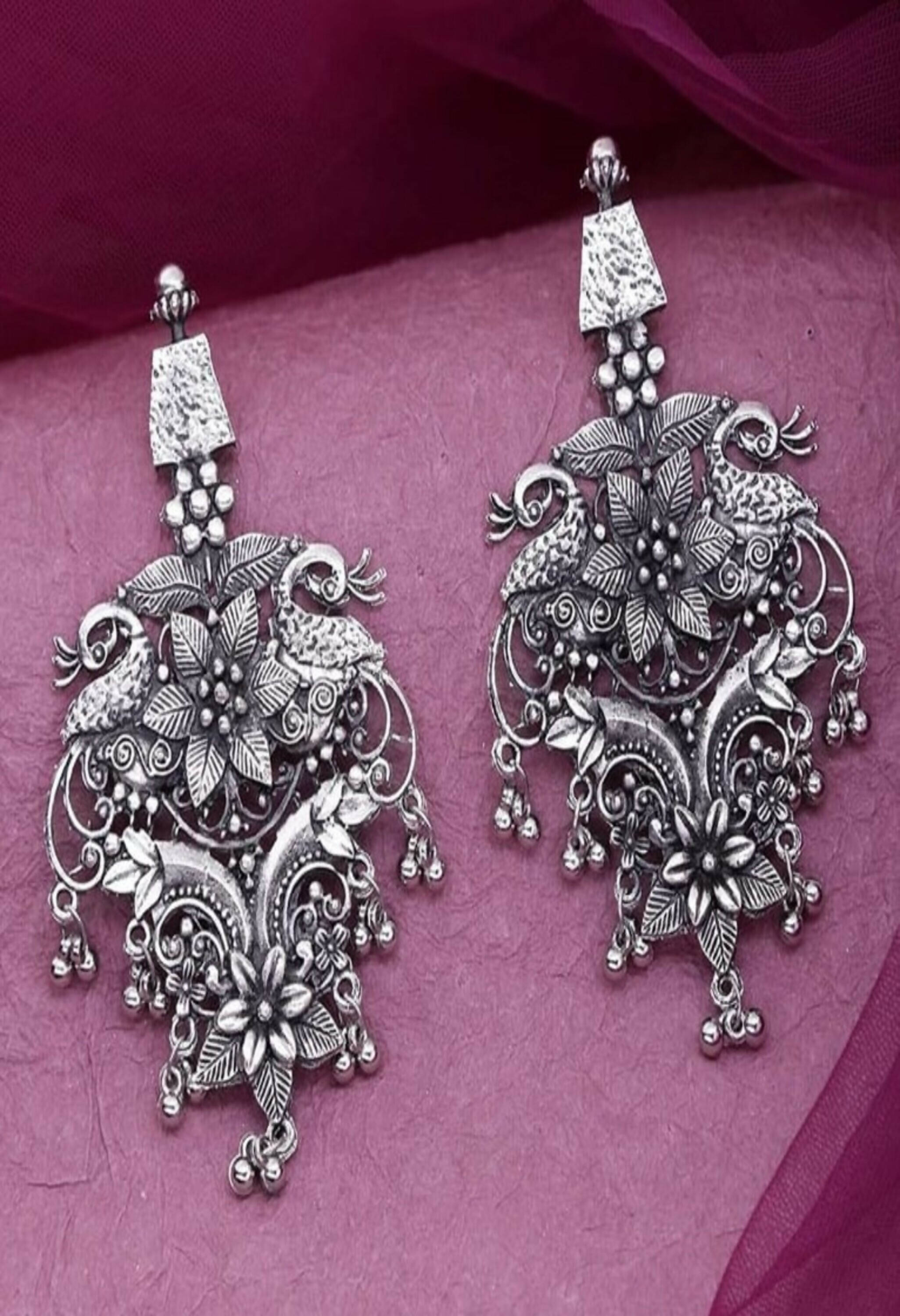 Silver-plated oxidised peacock design drop earrings for women