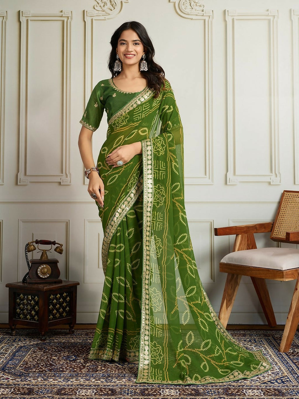 Green georgette saree with intricate Rajwadi Bandhani pattern.