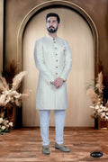 Yellow and white cotton silk kurta with intricate embroidery for young boys