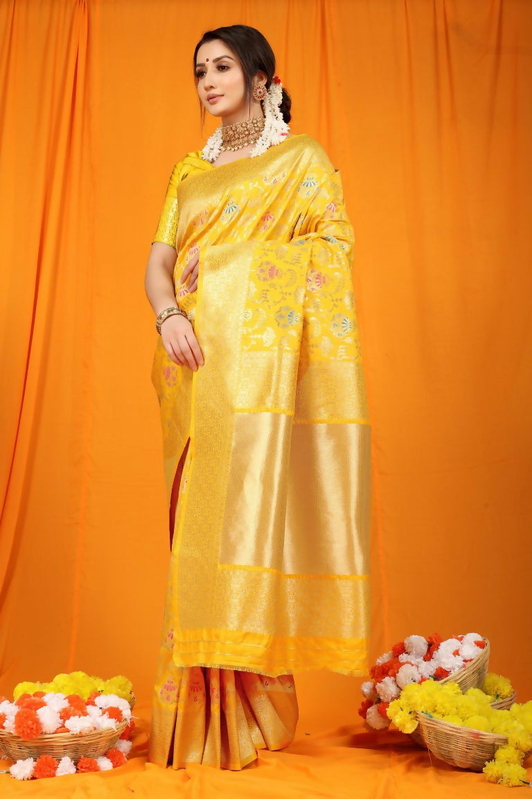 Yellow Kanjivaram silk saree with Zari woven work and matching blouse