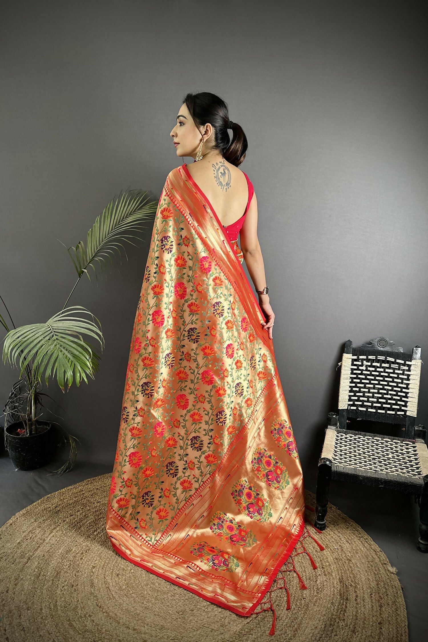 Light Orange Multi-Colored Floral Motif Soft Silk Paithani Saree