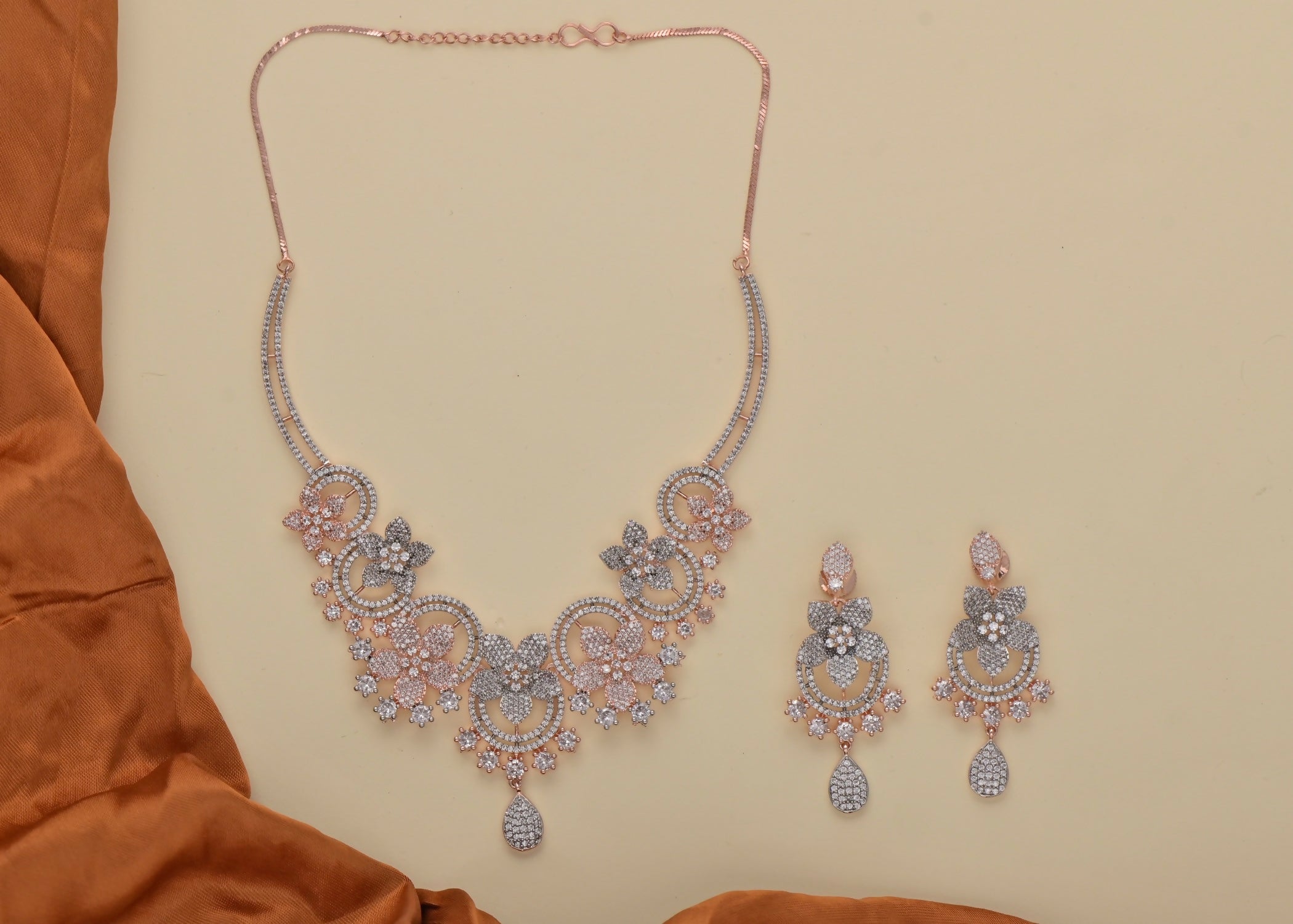Golden White AD necklace set featuring intricate brass craftsmanship and brilliant stone accents.