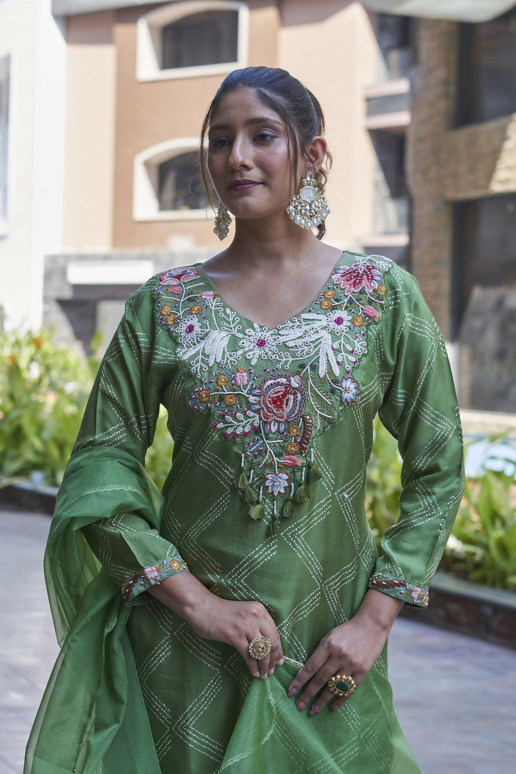 Elegant green pure viscose Dola silk kurta set with artisanal handwork and breathable cotton lining