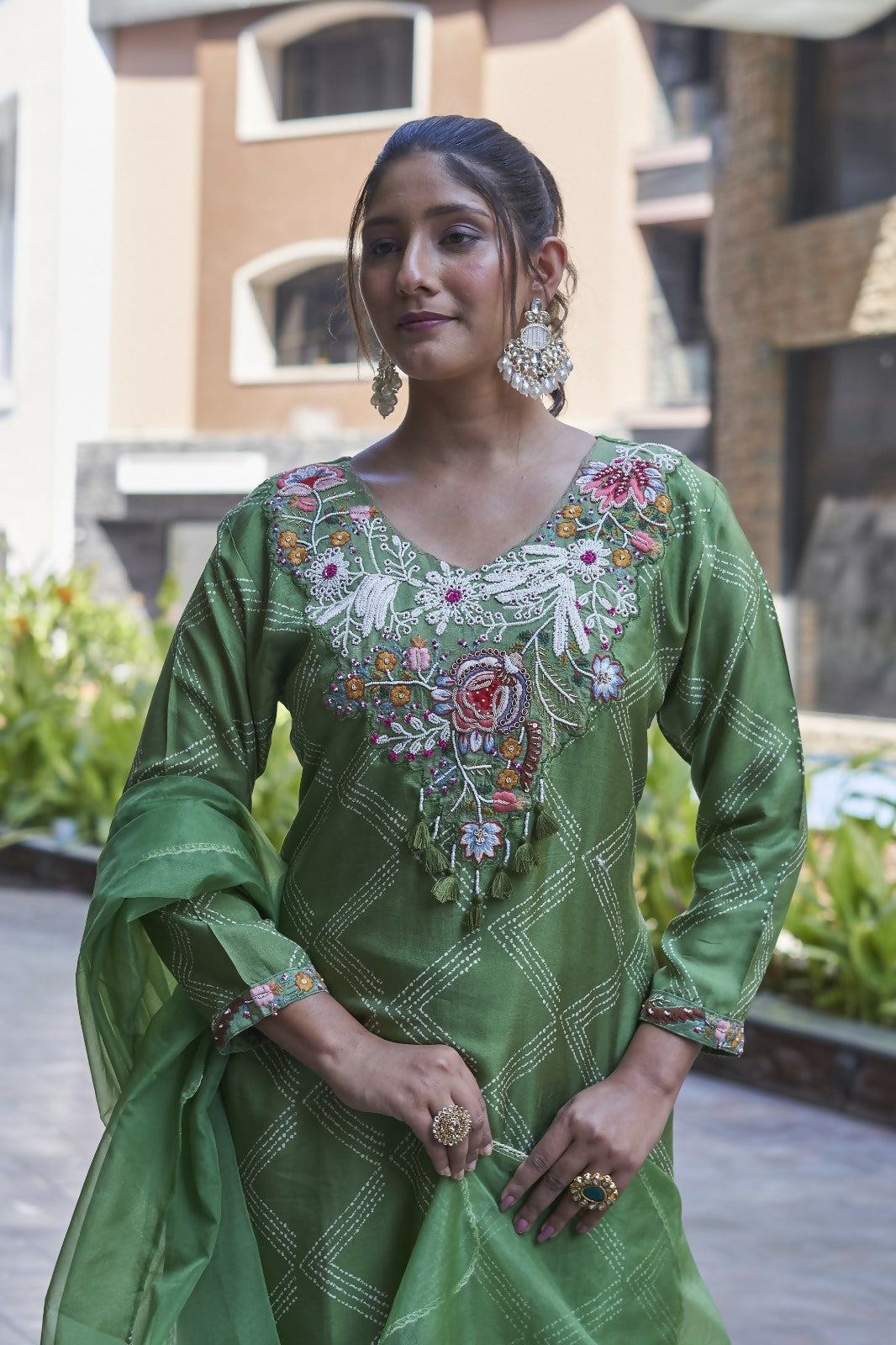 Elegant green pure viscose Dola silk kurta set with artisanal handwork and breathable cotton lining