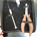 Babe Double Lock Tool with its included protective storage case