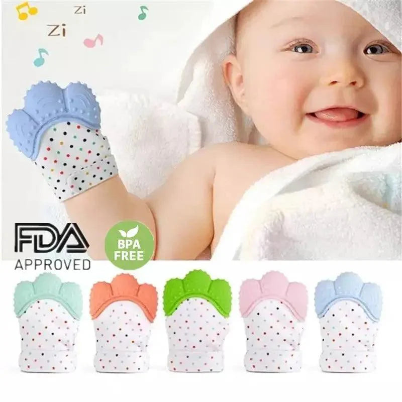 Baby wearing a white and multicolor animal print silicone teething mitten for gum relief