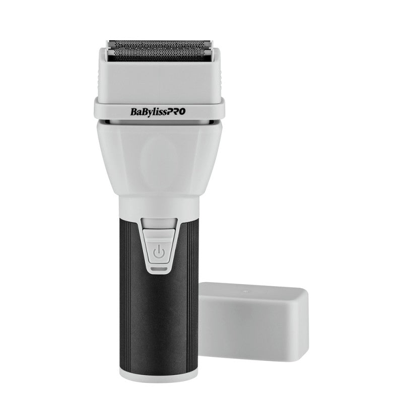 Monochromatic black and white COREFX professional double-foil shaver with metal grip
