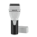 Monochromatic black and white COREFX professional double-foil shaver with metal grip