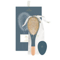 Bachca 3Pc Hair Kit featuring a detangling brush, pocket mirror, and dark blue cotton pouch.