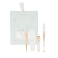 Bachca Paris manicure kit with white and gold metal tools in a pastel mint green case.