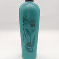 Bain de Terre Jasmine Moisturizing Conditioner in a teal 400ml bottle.